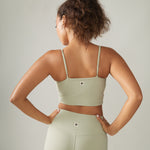 Women wearing the North Star Rib Soft Compression Sports Bra by Rose Boreal - Mint Over / Femme qui porte le soutien-gorge côtelé étoile du nord de Rose Boreal - Menthe Over